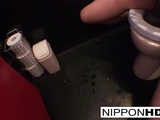 Japanese model masturbates in a public restroom